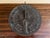 A classic vintage iron verdigris garden sundial inspired by traditional English estate landscapes, reading "Grow old along...