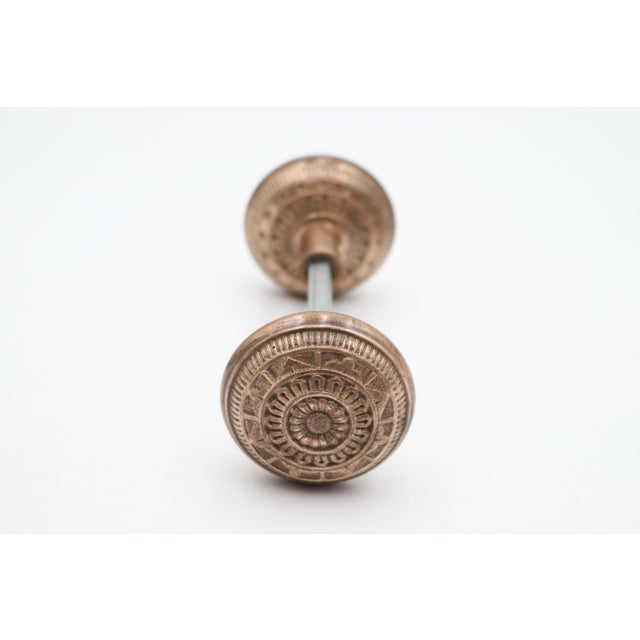 Mid 20th Century Pair of Antique Vernacular Polished Bronze Ornate Door Knobs For Sale - Image 5 of 6