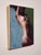 The painting depicts a figure in a dynamic pose, with an emphasis on the graceful lines of the body and the interplay of...