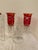 This lovely candelabra was part of my grandmother's cranberry glass collection.. Candles lit inside the cranberry glass...