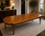 A refined traditional dining table attributed to Karges, showcasing elegant proportions and timeless craftsmanship. The...