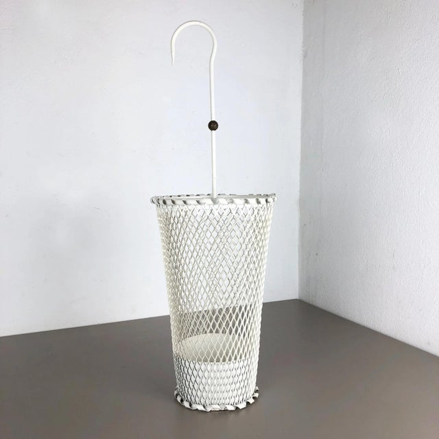 Umbrella stand in style of Matégot Origin: France Age: 1950s This original vintage umbrella stand was produced in the...