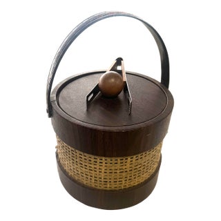Vintage Mid-Century Modern Ice Bucket Faux Wood Grain Finish With a Rattan or Wicker Overlay. Made in Usa. For Sale