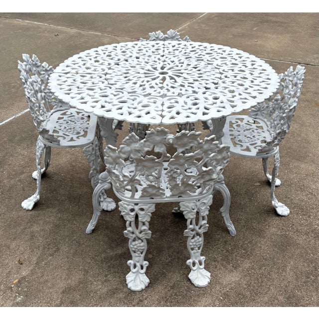 Love this mid century set of table and four chairs. Very heavy and substantial!