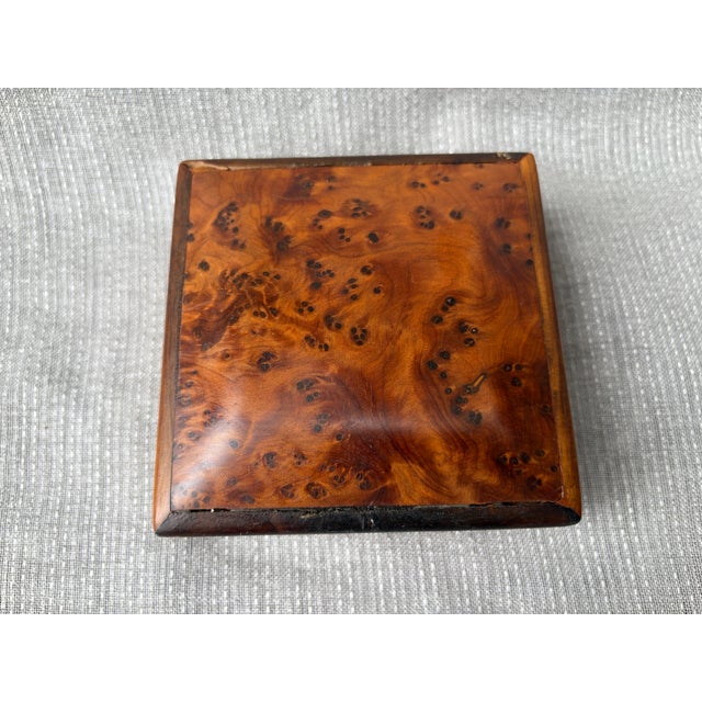 Small antique burl hinged box. Unmarked. Does have wear consistent with age, use, structurally sound. Box measures 4" by 3...