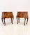 A charming pair of Italian bombe commodini featuring richly figured wood veneers and intricate geometric marquetry. Dating...