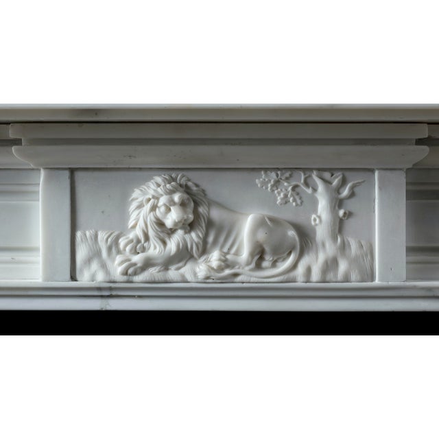 A fine and distinguished Georgian/Regency period Statuary Marble fireplace surround, with generous bed-mould below the...