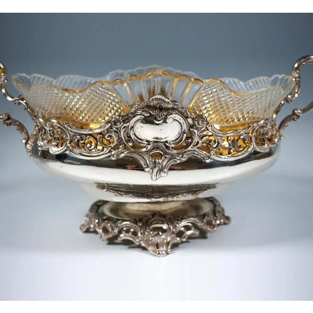 Elegant, festive silver vessel in an oval shape on a stepped base with projecting, pierced rocaille elements, pierced...