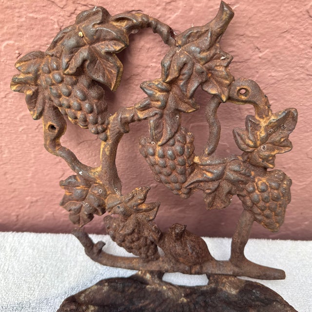Vintage Cast Iron Bird on Grapevine Wall Mounted Bird Feeder Garden Decor. This has been mounted on my wooden backyard...