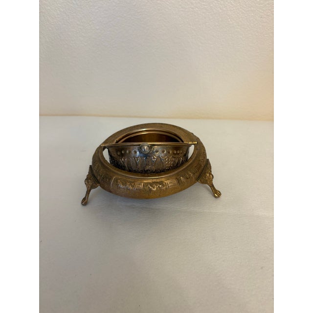 Bring global elegance to your next dinner party with this stunning vintage mid-century brass caviar server. Crafted with a...