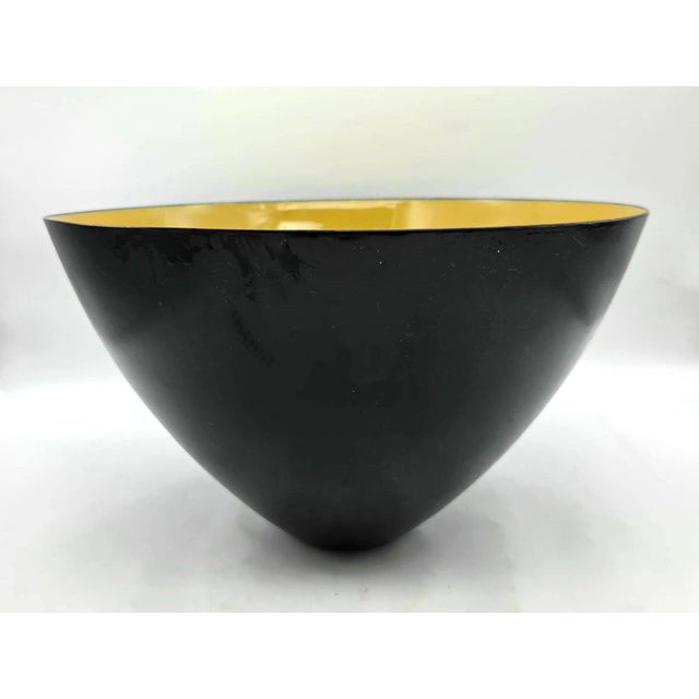 Offered is a 1960s Danish Krenit lime green or chartreuse enamel on black matte metal bowl designed originally by Herbert...