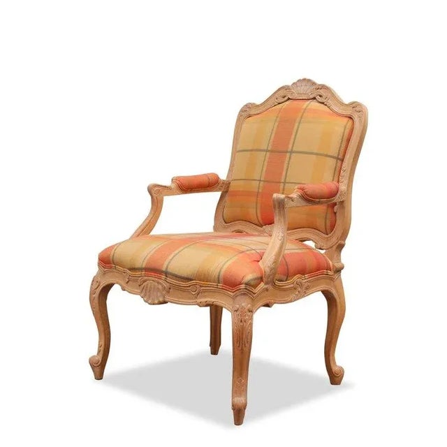 Elevate your interior with the timeless elegance of this Vintage Louis XV French hand-carved Armchair. The intricate...
