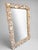 Monumental coastal grotto mirror with an exuberantly encrusted shellwork frame composed of natural oyster shells, scallop...