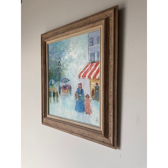 This charming vintage oil on canvas painting by YOLI depicts a lively Parisian street scene rendered in expressive...