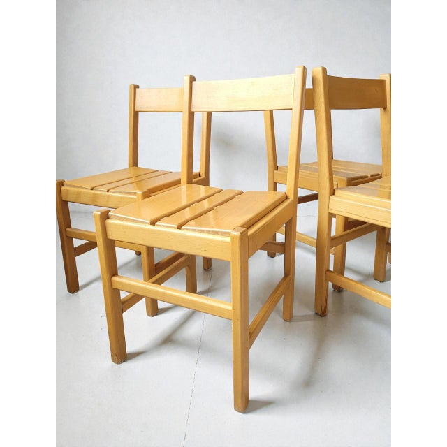Four solid beech chairs made in the 1980s in the style of Charlotte Perriand. Stable and comfortable seat. A timeless...
