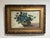 Traditional European antique oil still life of violets or forget-me-nots. The painting has visible craquelure and aging on...