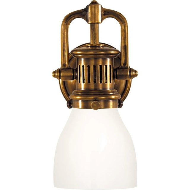 Yoke Suspended Sconce in Hand-Rubbed Antique Brass with White Glass Designer: Chapman & Myers Height: 10.25" Extension:...