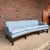 An elegant Mid-Century Modern curved front sofa attributed to Edward Wormley for Dunbar. While we have not been able to...