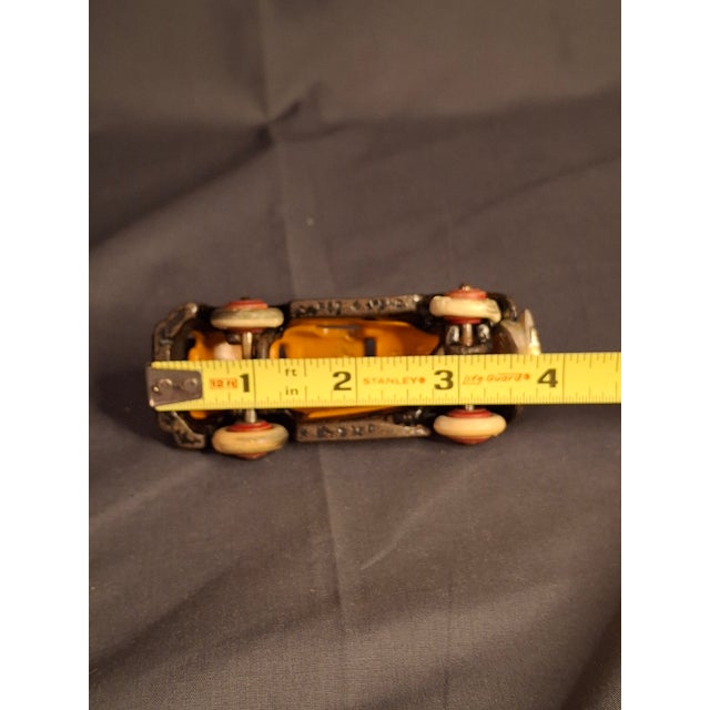 This is a remarkable example of early 20th-century American toy manufacturing: a Hubley Cast Iron Terraplane Coupe....