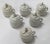 Set of six vintage porcelain floral Mottahedah pot de creme with floral lids and vine handles. Marked "Museum Mottahedah...