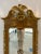 A striking George II style parcel gilt mirror with fabulous carvings! Broken, swans neck pediment crowned with a carved ho...
