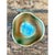 This vintage studio pottery bowl showcases a mesmerizing, painterly glaze composition centered around a vivid turquoise-...