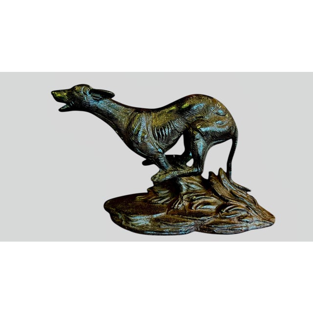 Vintage cast bronze racing greyhound on landscape base. Beautiful craftsmanship, intricate details, heavy weight, and rich...