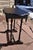 Spindle leg end table with curved table top and feet, spindled bottom brace and icicle-style spindle trim, single drawer.