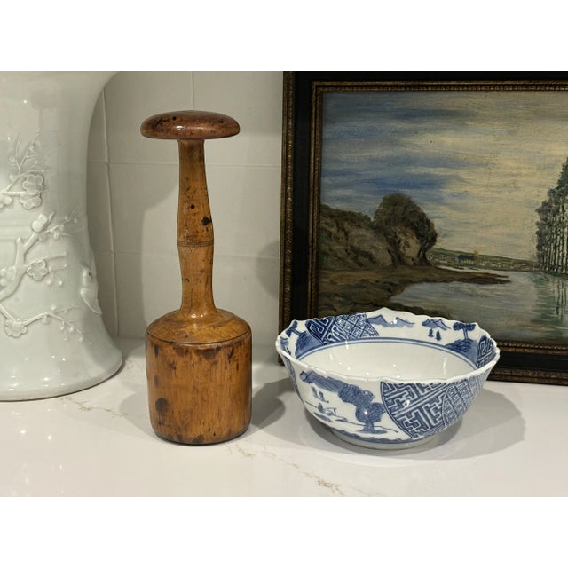 This masher/pestle is turned from one piece of solid wood. It has the loveliest, warm honey patina. MAKER'S MARK: None...