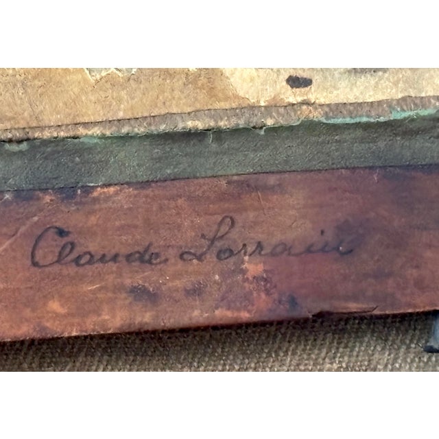 Idyllic 17th or 18th century landscape. The name "Claude Lorraine" is meticulously inscribed in the wood, though its...