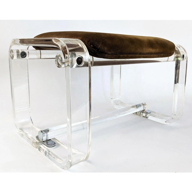 Vintage Lucite sleigh leg ottoman with soft fabric cushion and chrome hardware. Could be used as a stool. Very Sturdy.