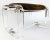 Vintage Lucite sleigh leg ottoman with soft fabric cushion and chrome hardware. Could be used as a stool. Very Sturdy.