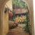 Signed 1940's oil on board of an interior garden courtyard. Newly framed with linen-look mat.