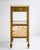 A charming example of early 20th century French furniture, constructed with a brass frame and drawer that has developed a...
