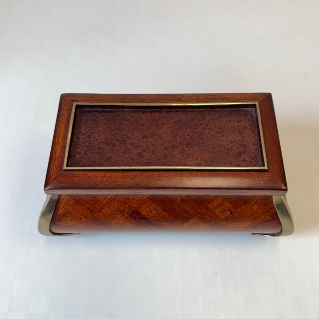 A stunning vintage Maitland Smith (tagged) box, with a mahogany parquet veneer, brass corner and trim details and leather...