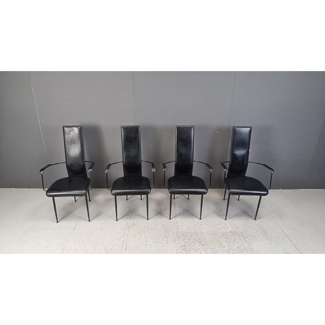 Set of 4 black leather dining chairs designed by Giancarlo Vegni for Fasem italy. - Model S44, rare model with armrests...