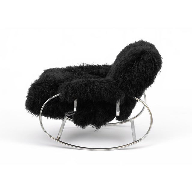 Rocking chair by Guido Faleschini, realized in 1970s. Chromed stell and mongolian-style fur. A striking and sculptural...