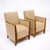 French bergères from the Art Deco period. These chairs are crafted with polished burled ash armrests and wood structures...