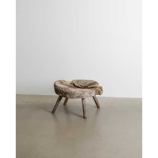 A rare antique and decorative swedish four legged wooden side table in natural patinated pine wood from the 1800s. Most...