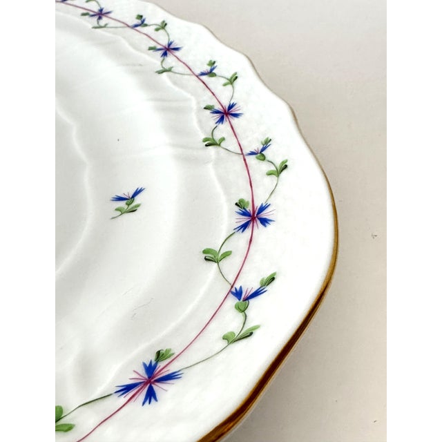 This Herend Blue Garland serving platter showcases the renowned craftsmanship of Herend porcelain. Created in 1985, the...