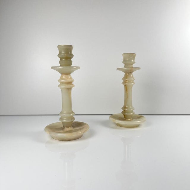 Pair of Alabaster Candlesticks, 20th Century Dimensions: Diameter: 11 cm Height: 21 & 23 cm Vintage items, show signs of...