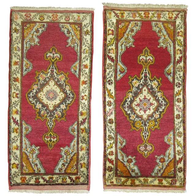 Rare set of vintage Turkish Oushak rugs. Measuring 19'' x 38'' and 22'' x 42''.