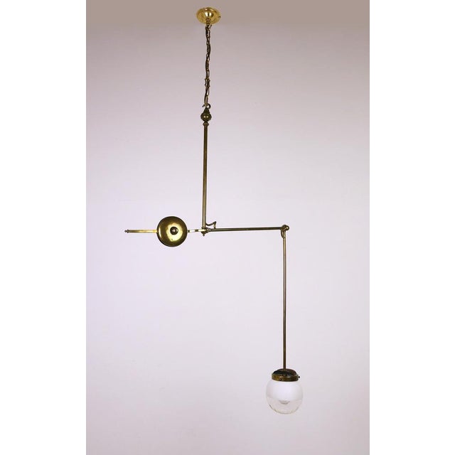 Adjustable ceiling light for dentists from the 1940s by the English manufacturer Bland. The dentist lamp is made of brass...