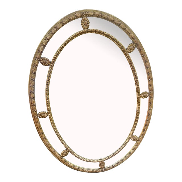 Handcrafted Stephen Cavallo Mirror Fair Decorative Carved Frame With Gilt Finish Featuring Carved Florettes and Border For Sale