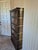 This is an antique Globe-Wernicke wooden barrister bookcase featuring a modular design with four stackable glass-front...