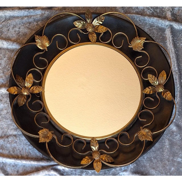 Vintage Round Wall Mirror with Black Metal Bracket with Brass Decorations, 1960s, in Very Good conditions. Designed 1960...