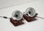 A pair of vintage table lamps, a classic example of Space Age design from the 1960s and 1970s. The design features an...