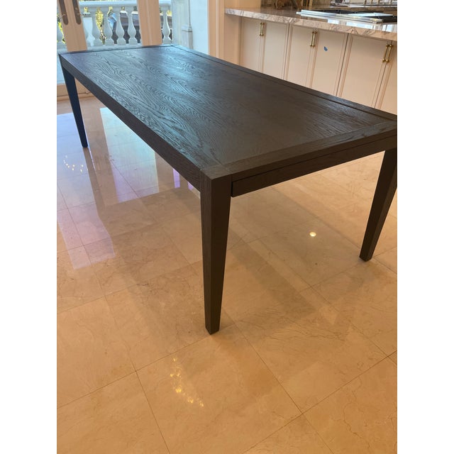 96 -144 inch black oak French contemporary rectangular extension dining table by restoration hardware. At 96 inches it has...
