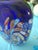 Technique: It uses the iconic Millefiori (thousand flowers) method, featuring fused multicolored glass canes (murrine) set...