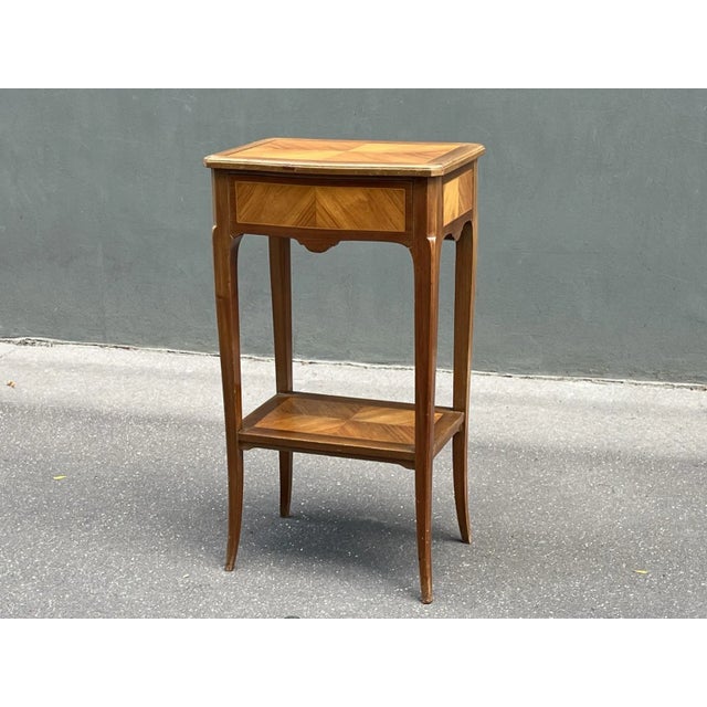 Neoclassic pedestal table French work from the middle of the XXth century. Made from solid wood and marquetry. Would be...